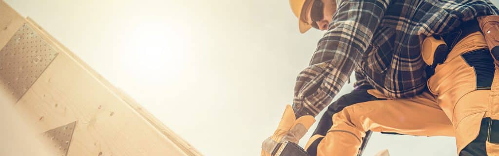 construction worker doing roofing work